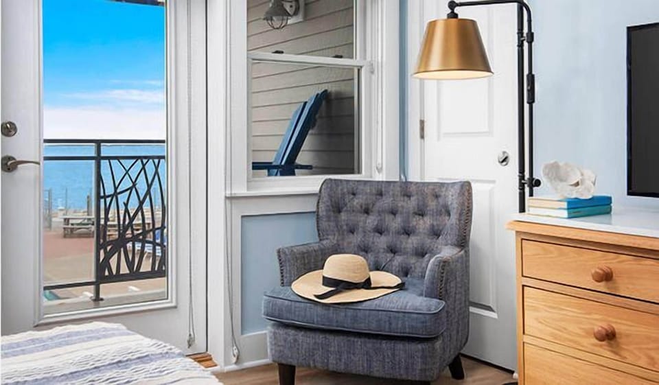 Sip morning coffee by the door to your sea-view balcony.