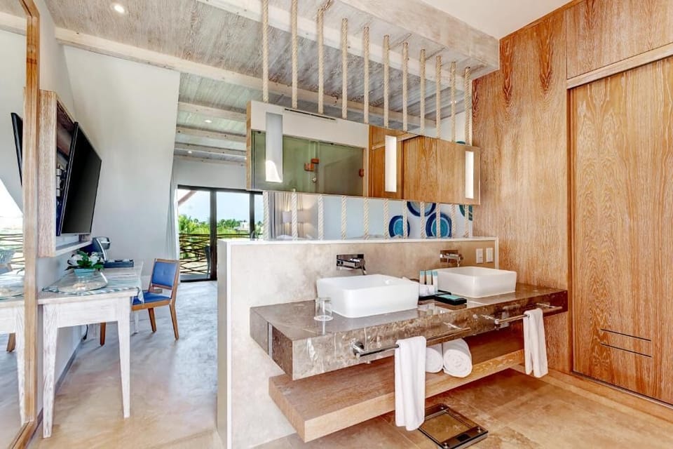 Refresh at the double vanity with spa-like finishes and space.