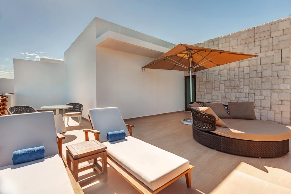 Soak up sunshine on loungers in your private terrace haven.