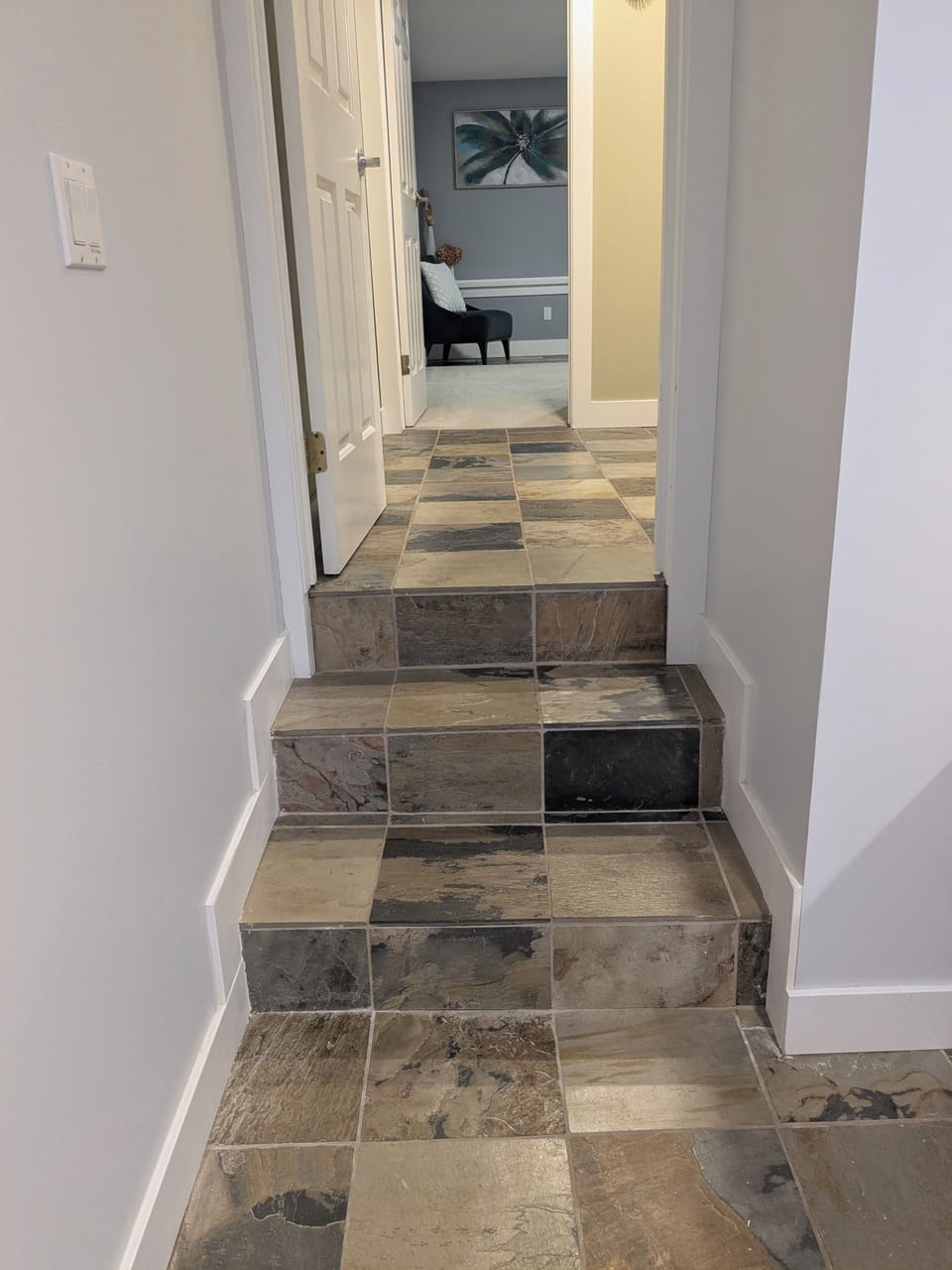 3 steps between living room and bedroom/bathroom area 