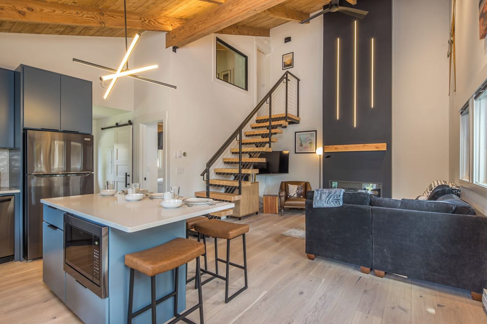 The custom fireplace is the centerpiece to the main level and is very beautiful!