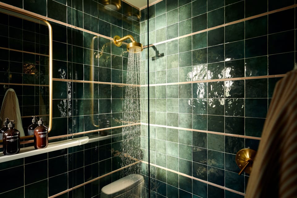 Rinse away the day under a rain shower with spa vibes.