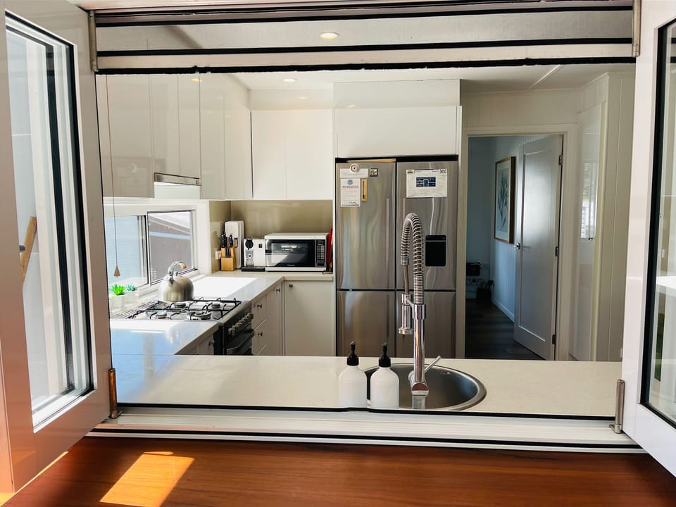 Kitchen through servery window