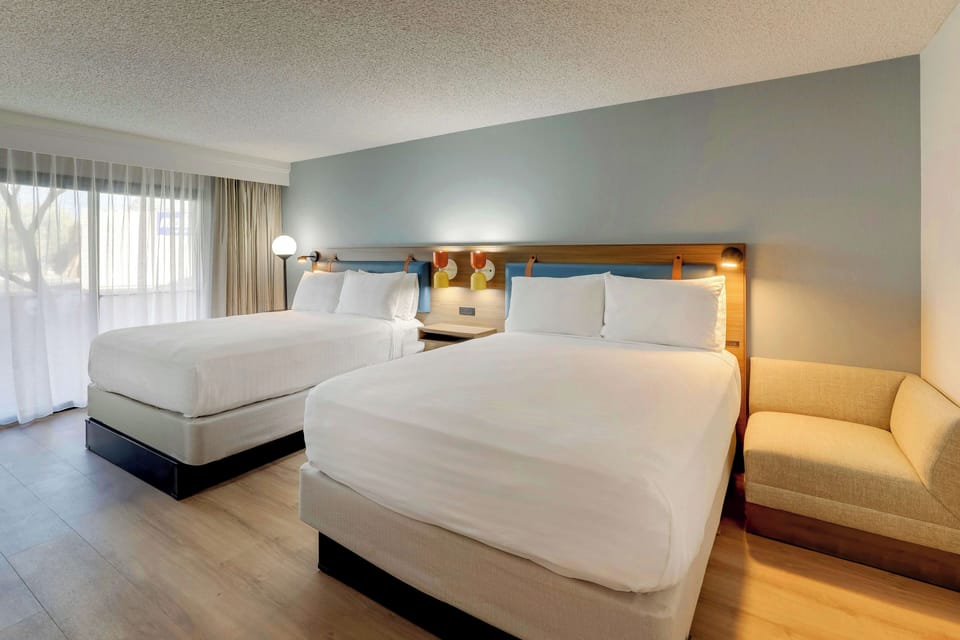 Unit with 2 Queen beds. Exact unit will be assigned upon arrival. Views, colors, and decor may vary.