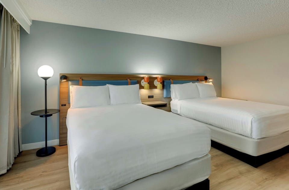 Unit with 2 Queen beds. Exact unit will be assigned upon arrival. Views, colors, and decor may vary.