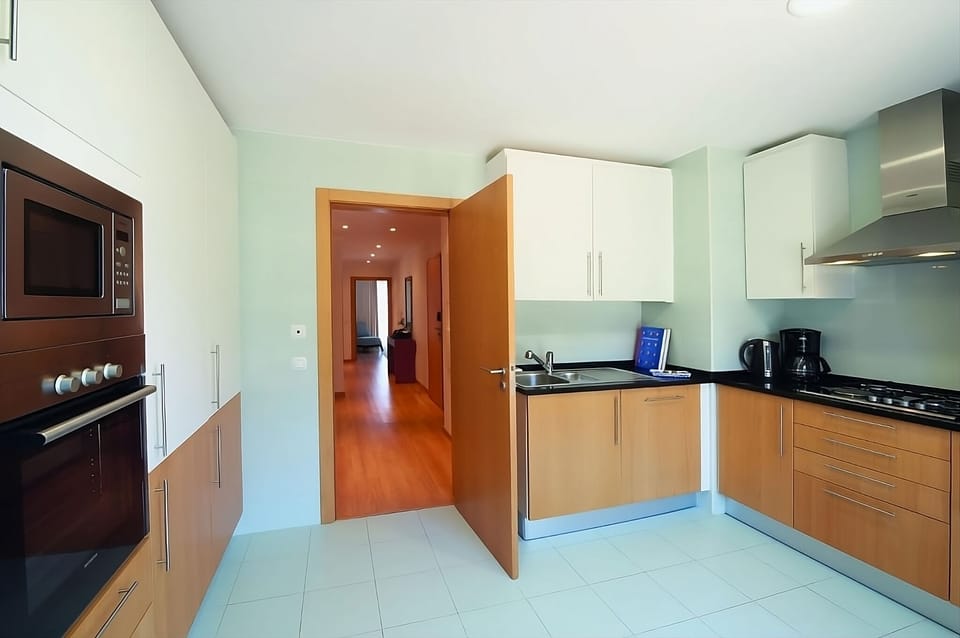 Cook with ease in the fully equipped kitchen with modern appliances.