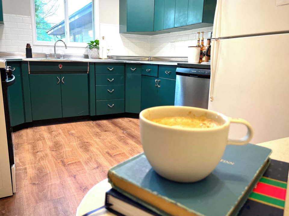 Kitchen - includes cooking utensils, pots, pans, etc. Oh did I mention there is a Nespresso maker with pods provided? And a coffee bar?! 