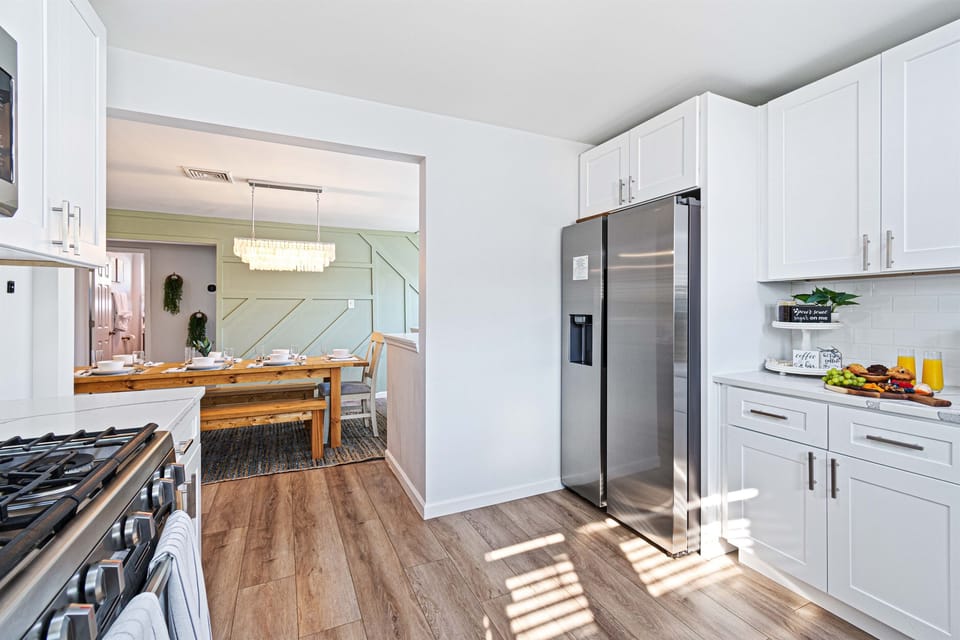 Keep your favorite snacks and ingredients neatly organized in our sleek and modern two-door refrigerator, a kitchen essential for any getaway.