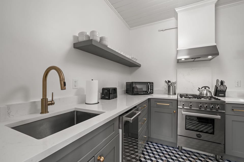 Upgraded stainless steel kitchen with cooking utensils