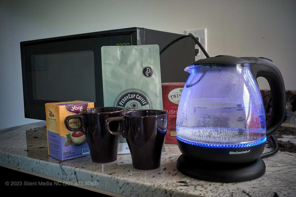 Microwave to heat, Eletric Kettle to make locally sourced coffee! Tea as well!