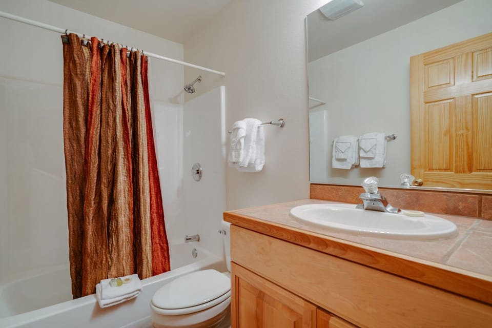 Second bathroom with shower-tub combo