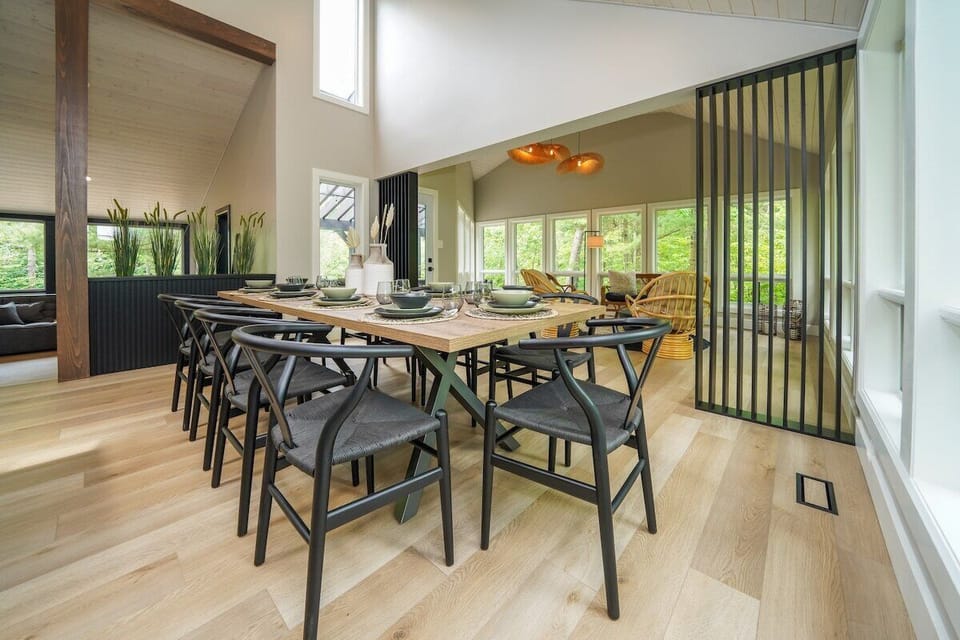 Every angle is captivating while you enjoy your meal or simply just enjoying company with family & friends around the dining table. 

After your meal is finished, find your way into the sunroom to unwind and connect with the natural beauty of the outdoors while enjoying great conversations with family & friends.