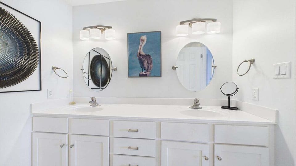 Master bathroom with dual vanity and walk in shower