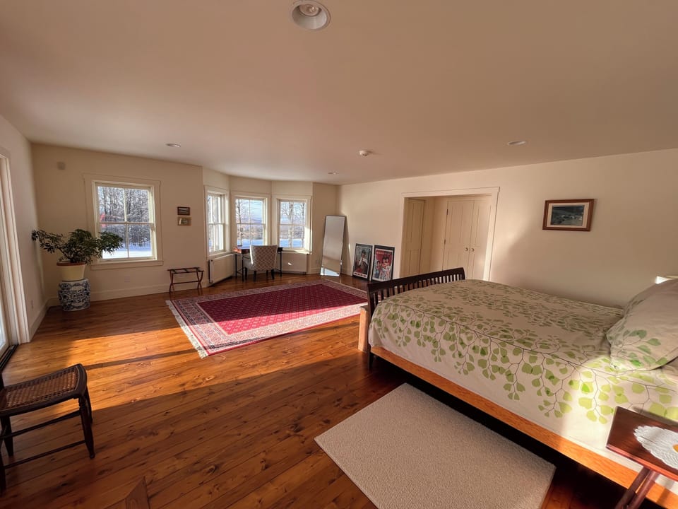 1st floor Main Bedroom w/ jacuzzi tub, king bed, private balcony, attached bath