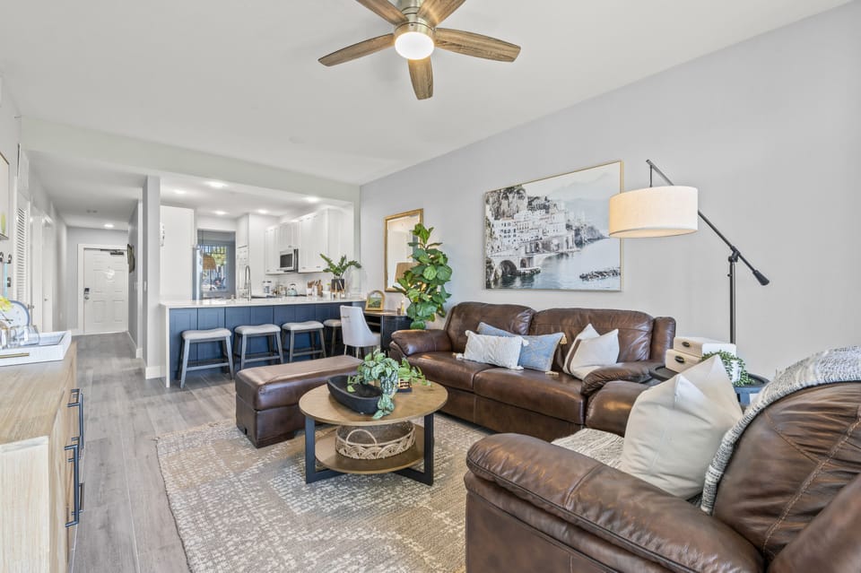 Welcome to Naples Retreat, an open-concept, modern-costal 2BD/2BR condominium