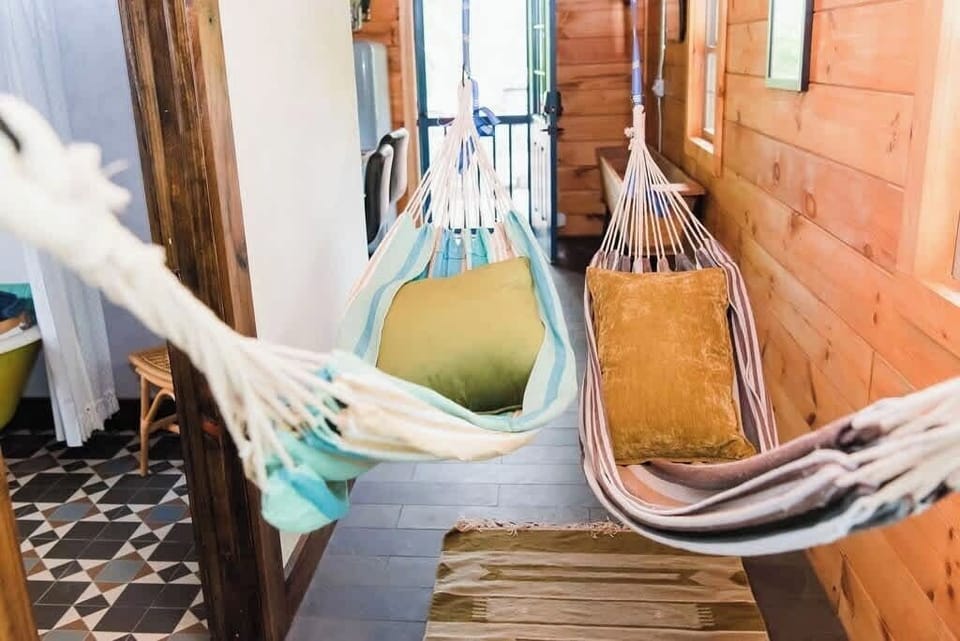 It is optional to hang hammocks on eno hooks in the hallway to sleep 2 additional guests. Hammocks are provided for free upon request. 

*tip: Our children love napping and sleeping overnight in the hammocks
