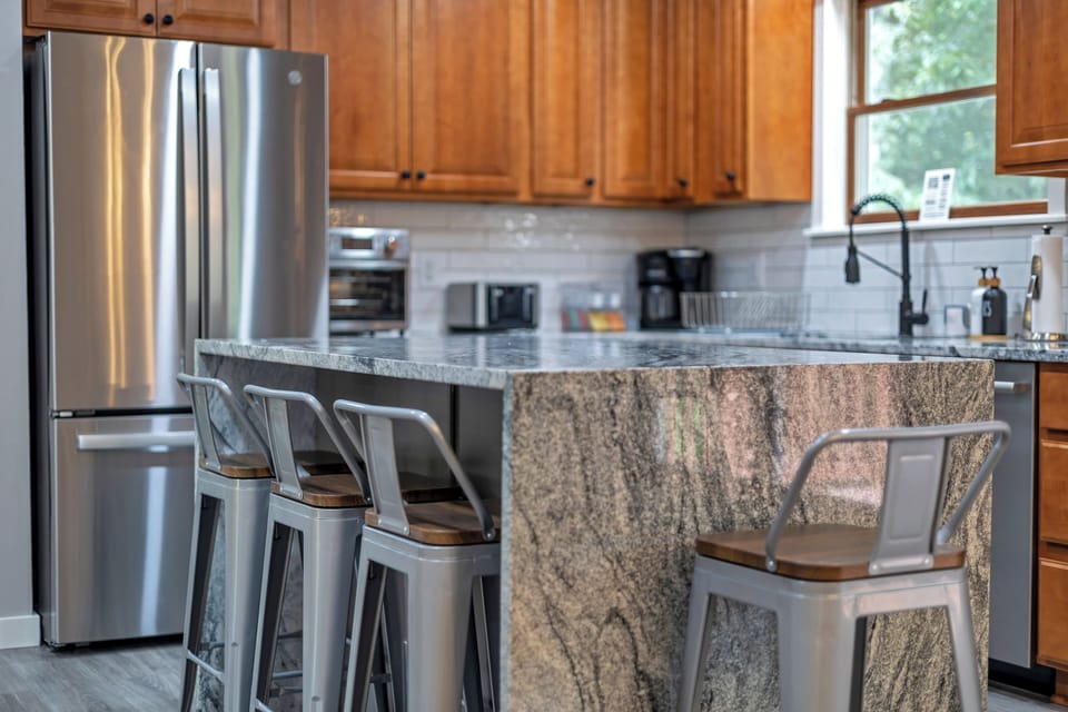Have a few drinks at the kitchen island and watch the designated chef in action.