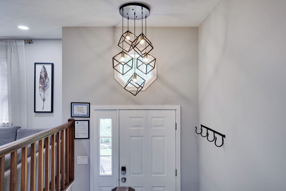 Entryway: Illuminate your arrival with stylish lighting and charming decor.