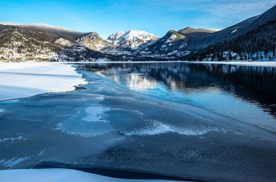 Experience the ultimate winter getaway at our beach area, with stunning mountain views and plenty of space to play and relax.