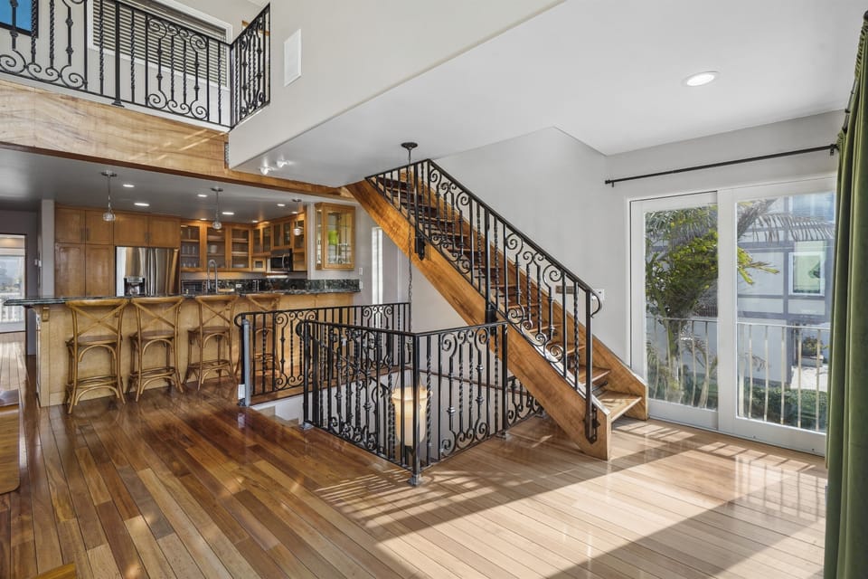 Head up to the third floor for two more bedrooms and a shared full bath.