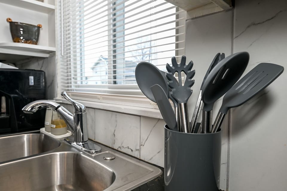 Stocked Kitchen!  Utensils, place settings, pots & pans, crock pot, basic spices