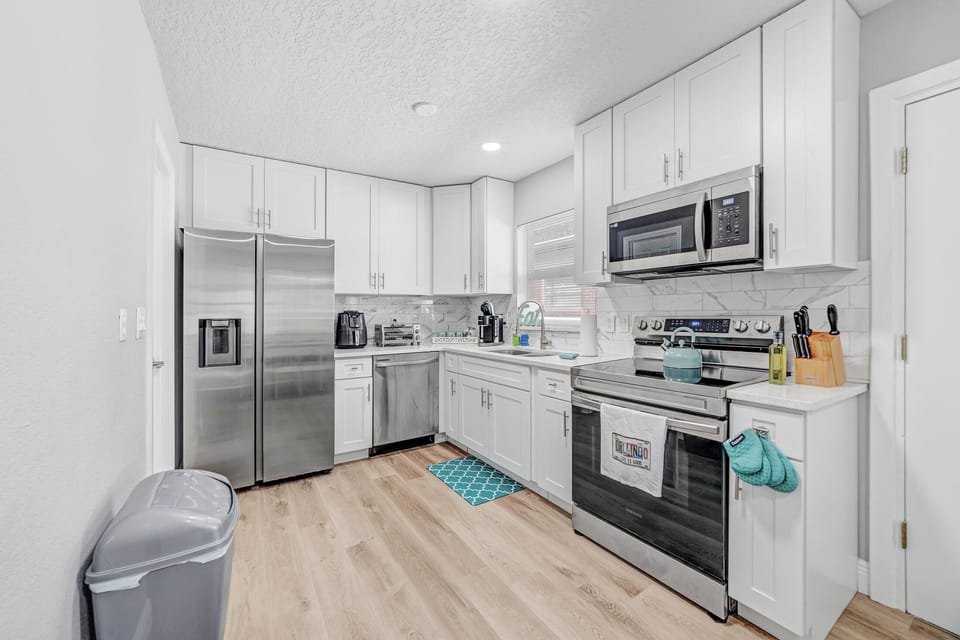 Kitchen with complementary coffee. Air fryer, Toaster Oven, Keurig.
