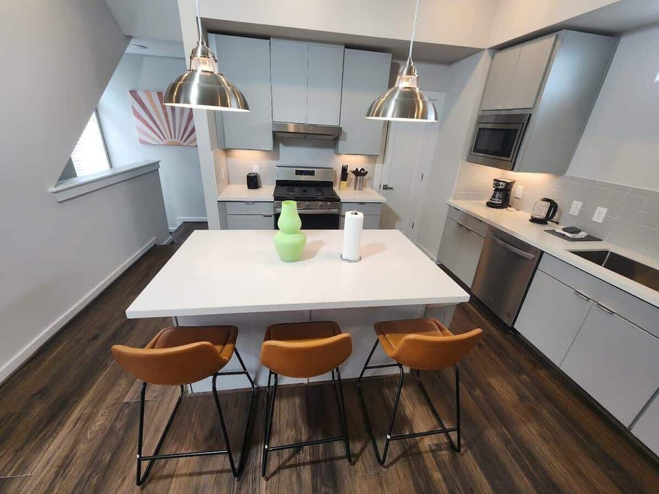 Zen House Kitchen: With ample storage, efficient organization systems, and thoughtfully placed task lighting, this modern kitchen is a true embodiment of contemporary style, functionality, and innovation.




