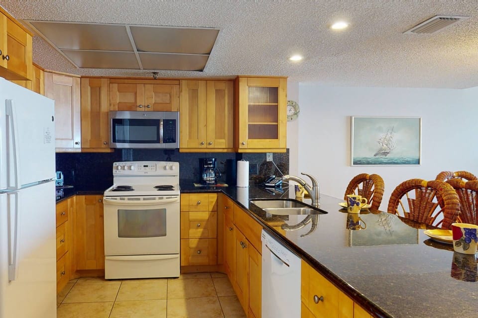 Fully Equipped Kitchen with Granite Counters and Dishwasher