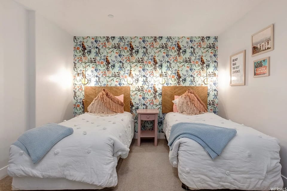 The downstairs flex space (not included in BR count) features two twin beds. 