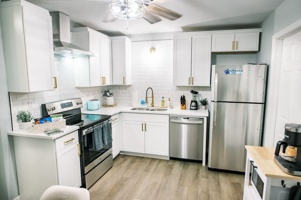 This fully updated kitchen boasts brand-new stainless steel appliances and is thoughtfully stocked with everything you need to effortlessly create a delicious meal.