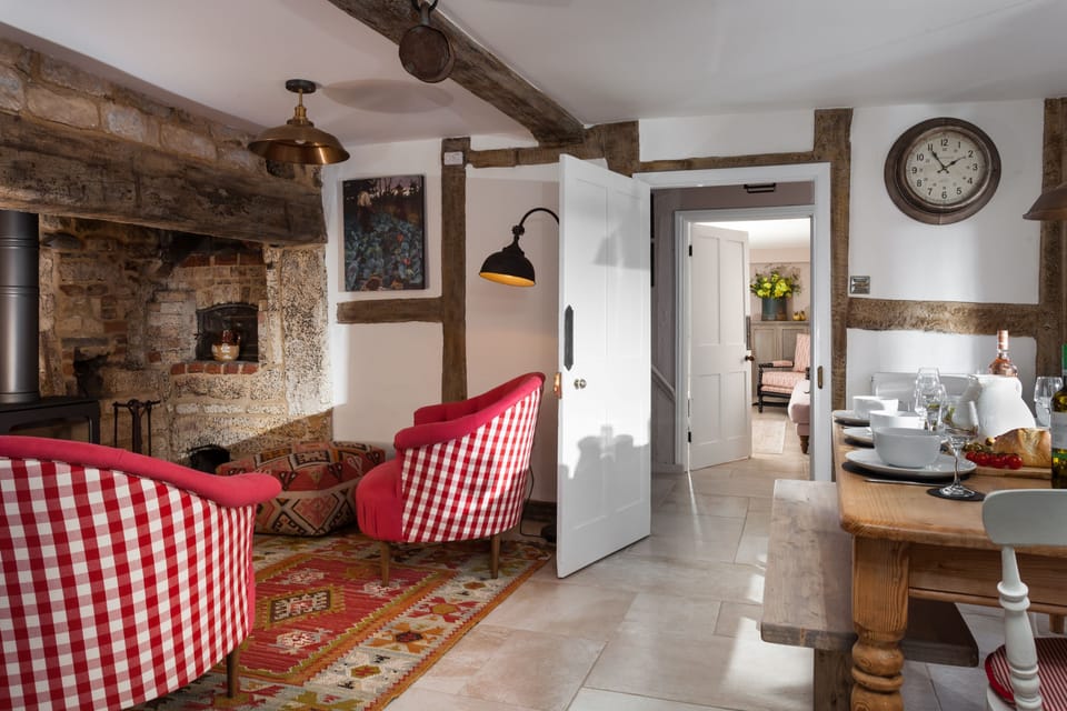 Dining area with inglenook fireplace and wood burning stove