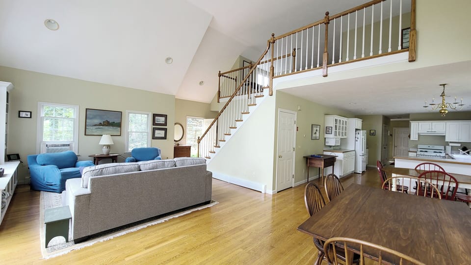 Open and bright main living area with vaulted ceiling