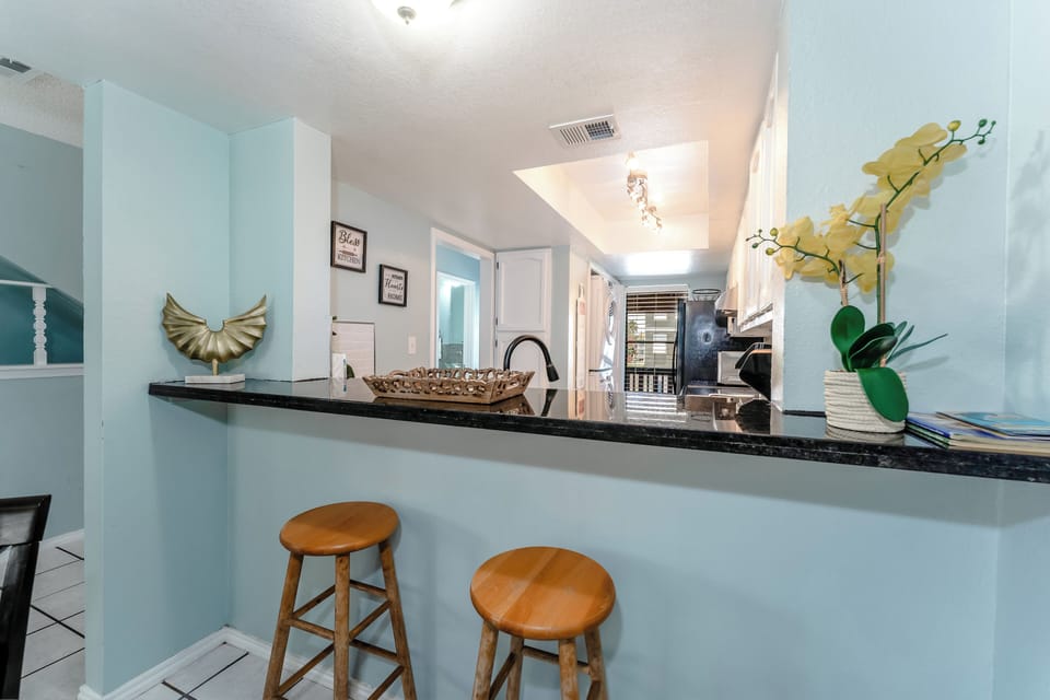 Your vacation home includes this breakfast bar complete with 2 stools!