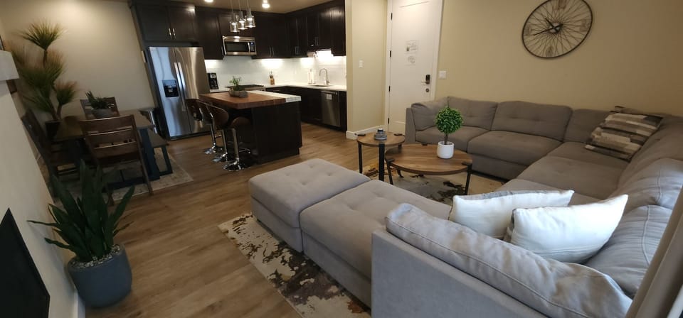 The living area opens seamlessly to the luxury kitchen.