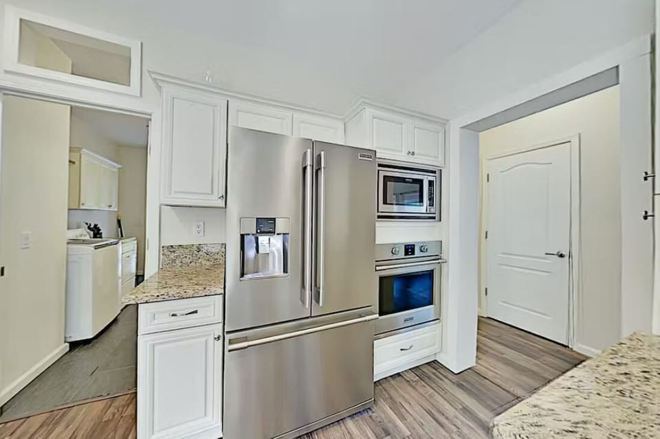 New stainless steel appliances and ample counter space.
