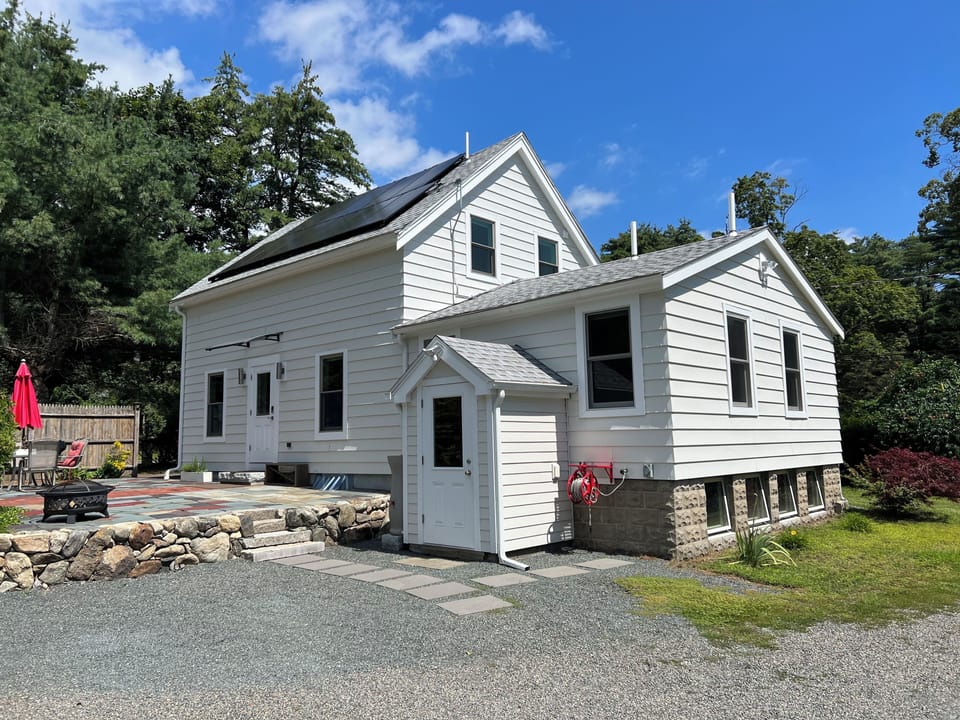 Exterior of the home showing two entrances.
Right side entry is to the basement.