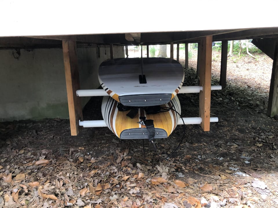 view of stand up paddle boards