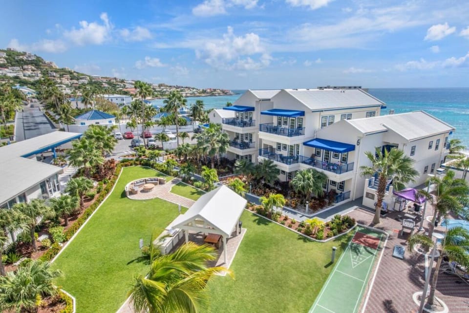 Stroll through lush grounds with coastal views all around.