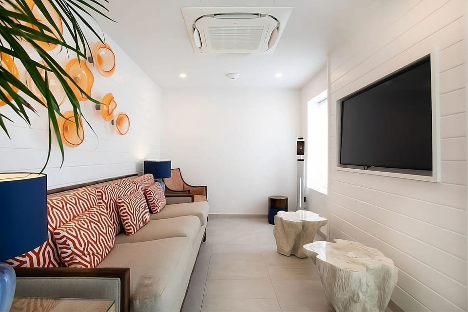 Kick back on the plush sofa for a cozy movie night.