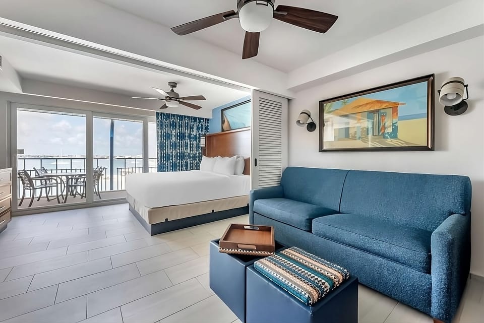Wake up to balcony breezes and wide-open ocean views.