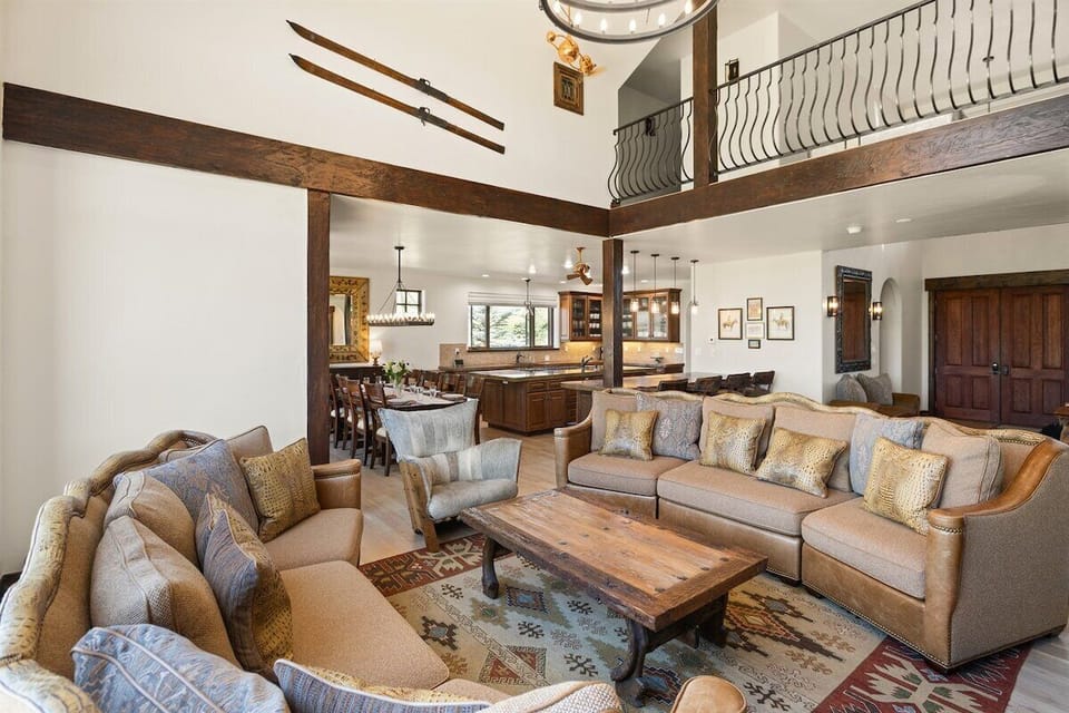 Comfortable living area with gas fireplace, smart-TV, comfy sofas and expansive views.