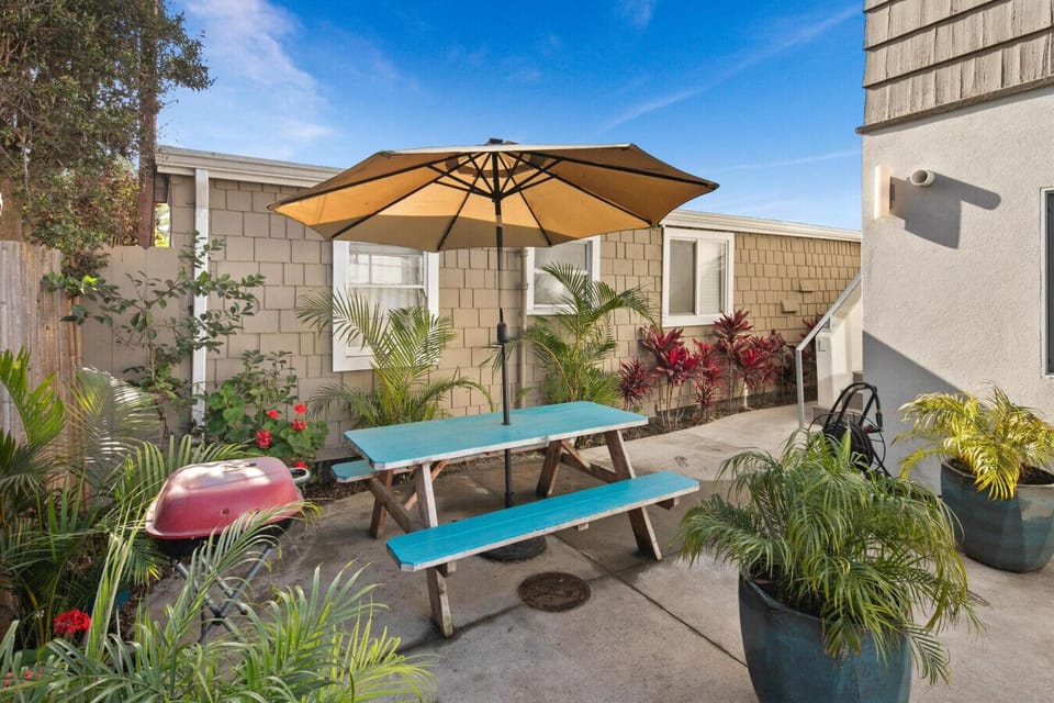 Outdoor seating and charcoal BBQ