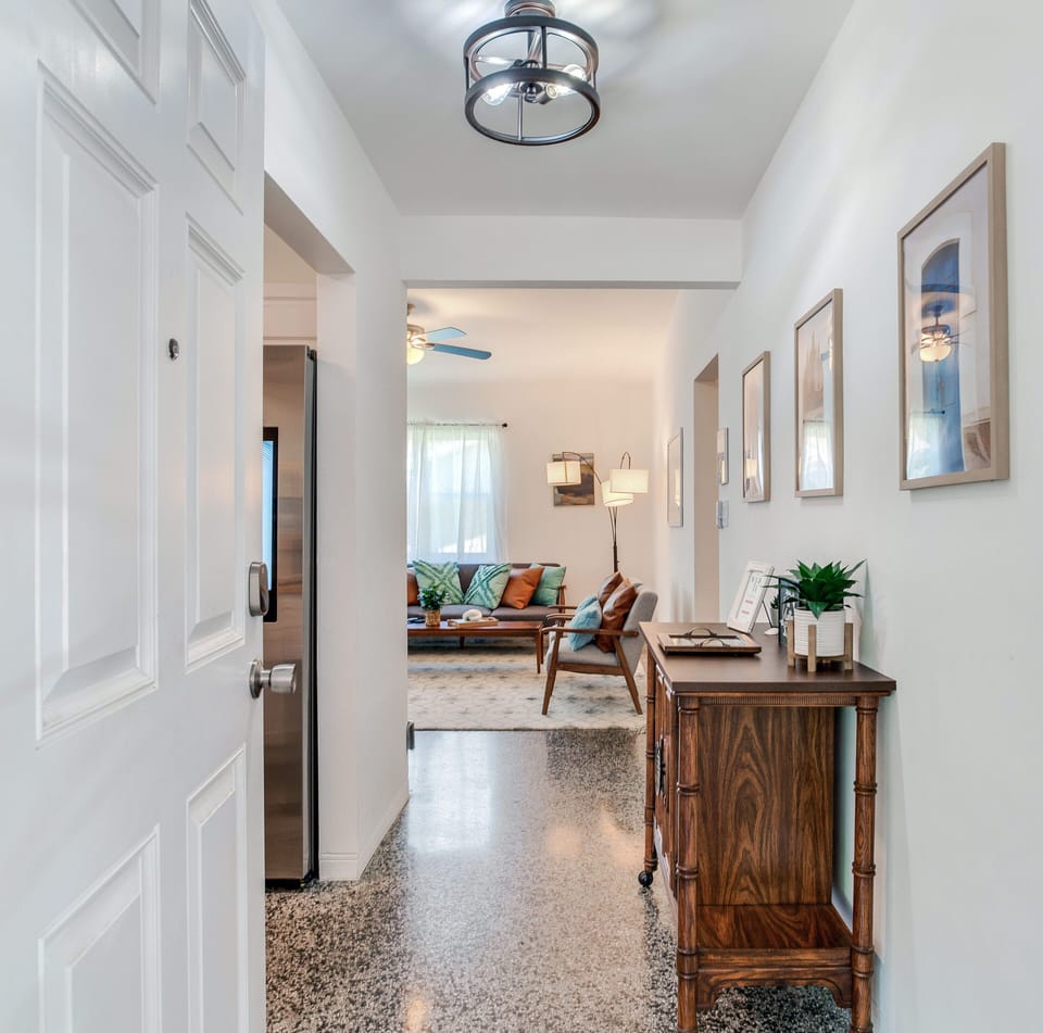 Front door is located in the sunroom