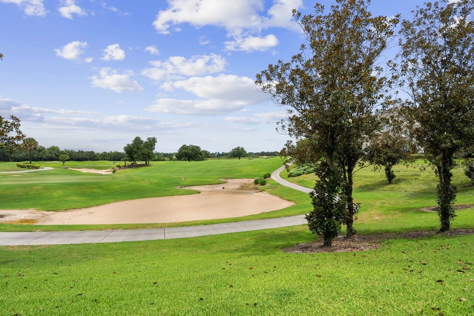 Golf course panorama: Breathtaking views from the balcony.