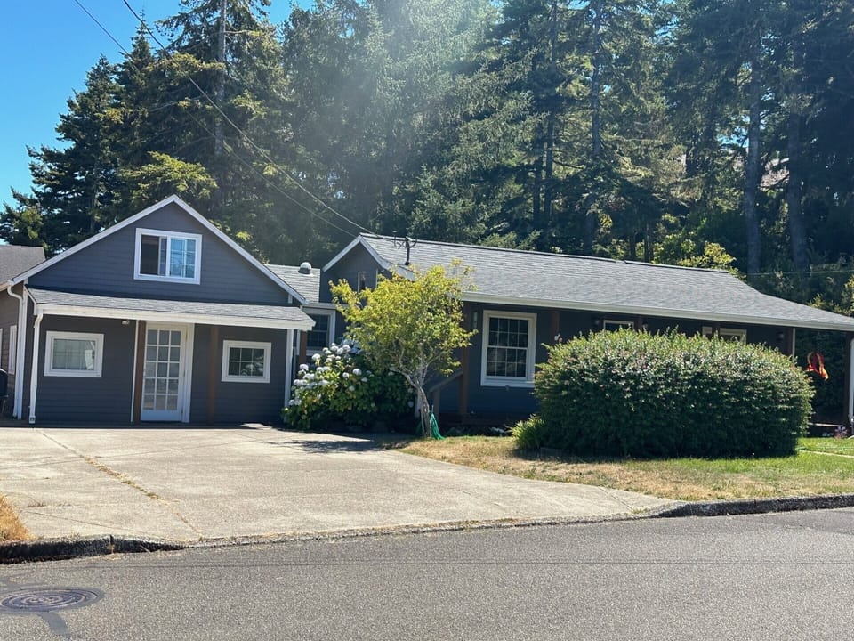 Large parking pad and entrances.
