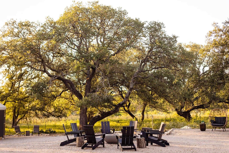Unwind at sunset around the fire pit beneath Texas Hill Country skies.