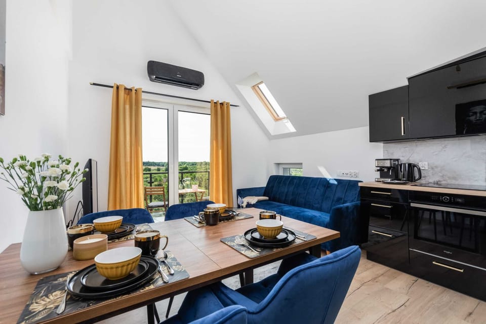 Full view of the dining and living area, showcasing a cohesive modern design.

