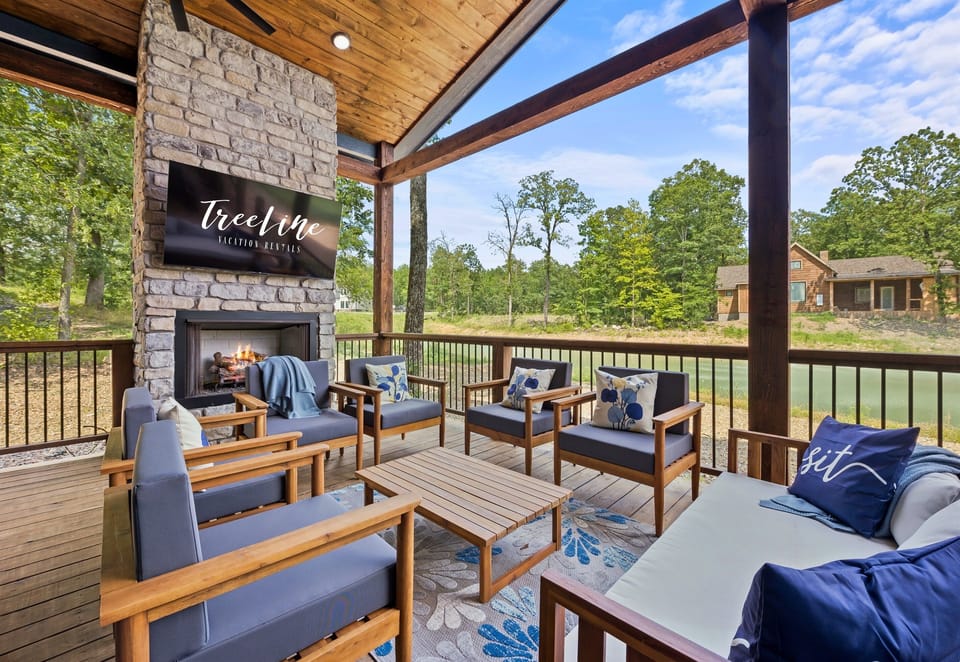 Cozy up by the outdoor fireplace and let the serene woodland views set the mood for an unforgettable evening at our tranquil escape.