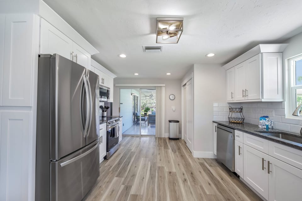 Kitchen to Lanai, perfect for those outside dinners.