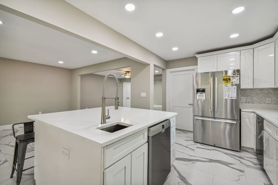 Large kitchen offers 2 (brand new Bosch) dishwashers & 2 sinks.